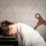 businesswoman sleeping on laptop